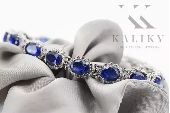 Złota bransoletka tenisowa 14k 585 z szafirami i brylantami tbd001w