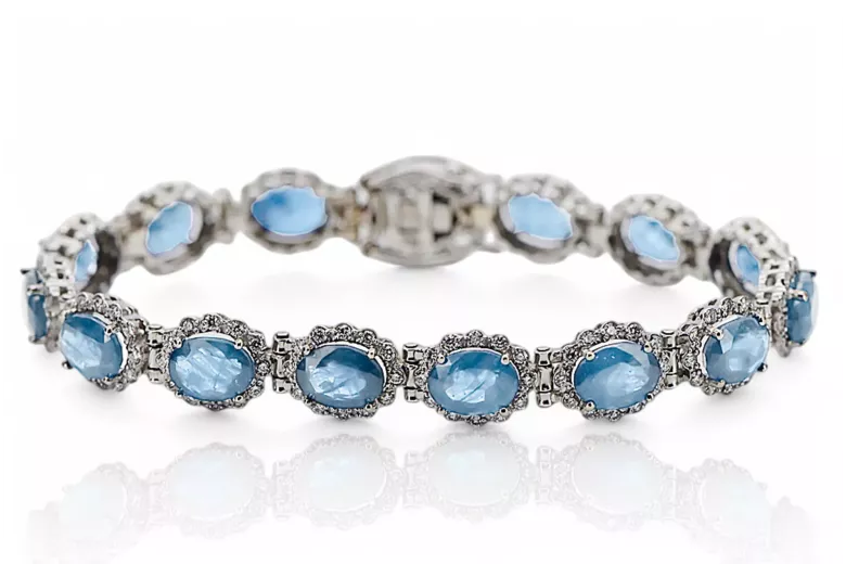 Pulsera de tenis con aguamarina y circonitas en oro blanco de 14k tbc001w