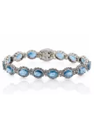 Pulsera de tenis con aguamarina y circonitas en oro blanco de 14k tbc001w