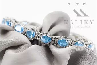 Теннисный браслет из белого золота 14 карат с аквамарином и цирконами tbc001w