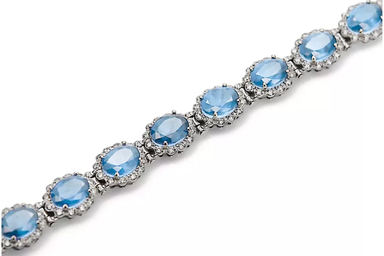Tennisarmband aus 14 Karat Weißgold mit Aquamarin und Zirkonen tbc001w