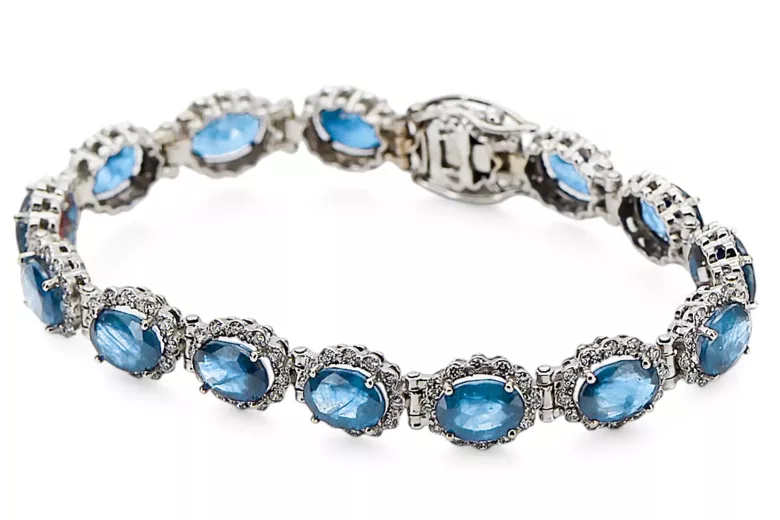 Tennisarmband aus 14 Karat Weißgold mit Aquamarin und Zirkonen tbc001w
