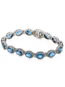 Pulsera de tenis con aguamarina y circonitas en oro blanco de 14k tbc001w