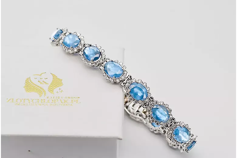 Pulsera de tenis con aguamarina y circonitas en oro blanco de 14k tbc001w