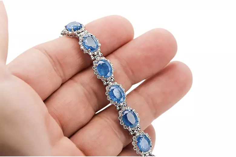 Tennisarmband aus 14 Karat Weißgold mit Aquamarin und Zirkonen tbc001w