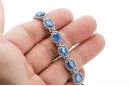 Tennisarmband aus 14 Karat Weißgold mit Aquamarin und Zirkonen tbc001w