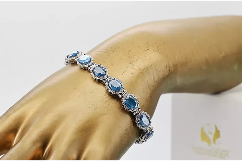 Pulsera de tenis con aguamarina y circonitas en oro blanco de 14k tbc001w