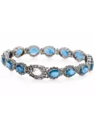 Pulsera de tenis con aguamarina y circonitas en oro blanco de 14k tbc001w
