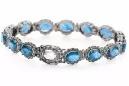 Tennisarmband aus 14 Karat Weißgold mit Aquamarin und Zirkonen tbc001w