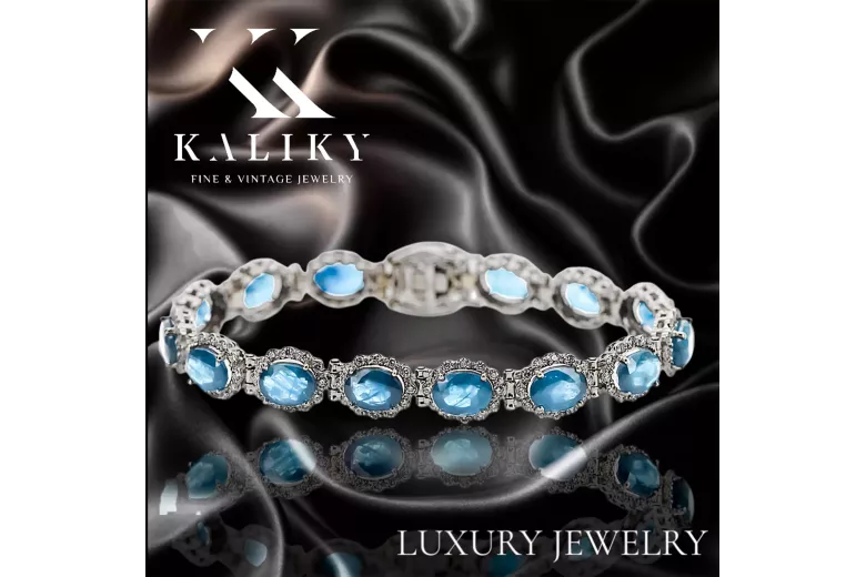 Pulsera de tenis con aguamarina y circonitas en oro blanco de 14k tbc001w