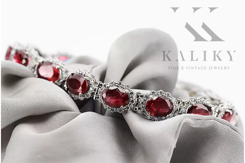 Pulsera de tenis con rubíes y circonitas en oro blanco de 14k tbc001w