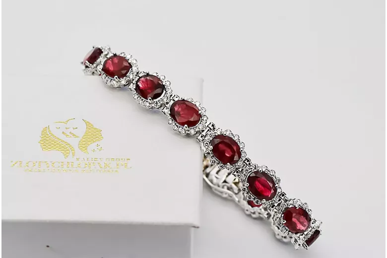 Pulsera de tenis con rubíes y circonitas en oro blanco de 14k tbc001w