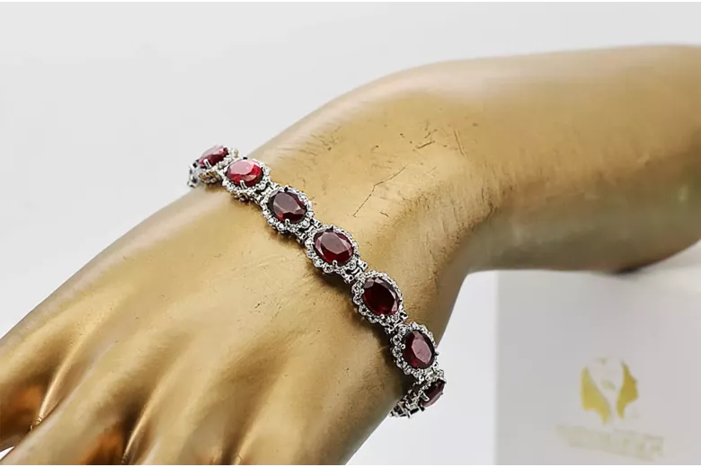 Pulsera de tenis con rubíes y circonitas en oro blanco de 14k tbc001w