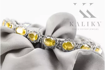 Bracelet tennis en or blanc 14 carats avec péridots et zircons tbc001w