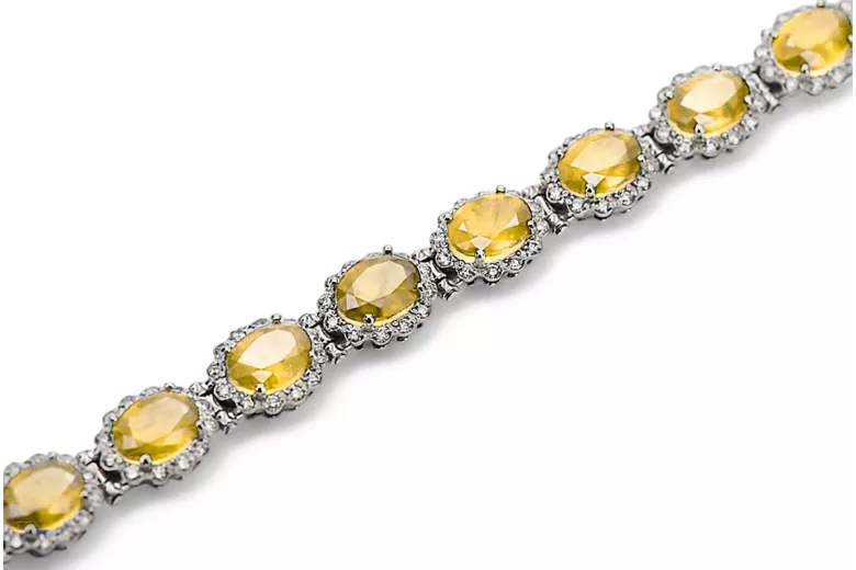 Bransoletka tenisowa z białego złota 14k 585 z peridotem i cyrkoniami tbc001w