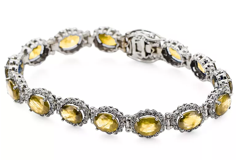 Bransoletka tenisowa z białego złota 14k 585 z peridotem i cyrkoniami tbc001w