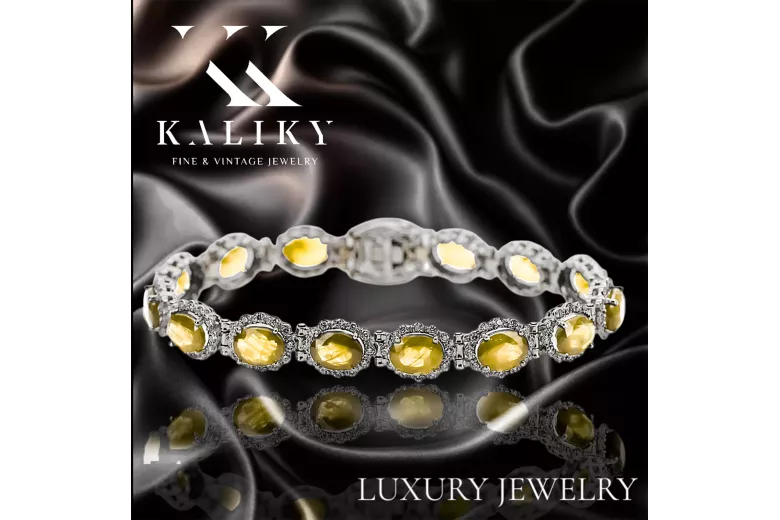 Pulsera de tenis de oro blanco de 14k con peridotos y circonitas tbc001w