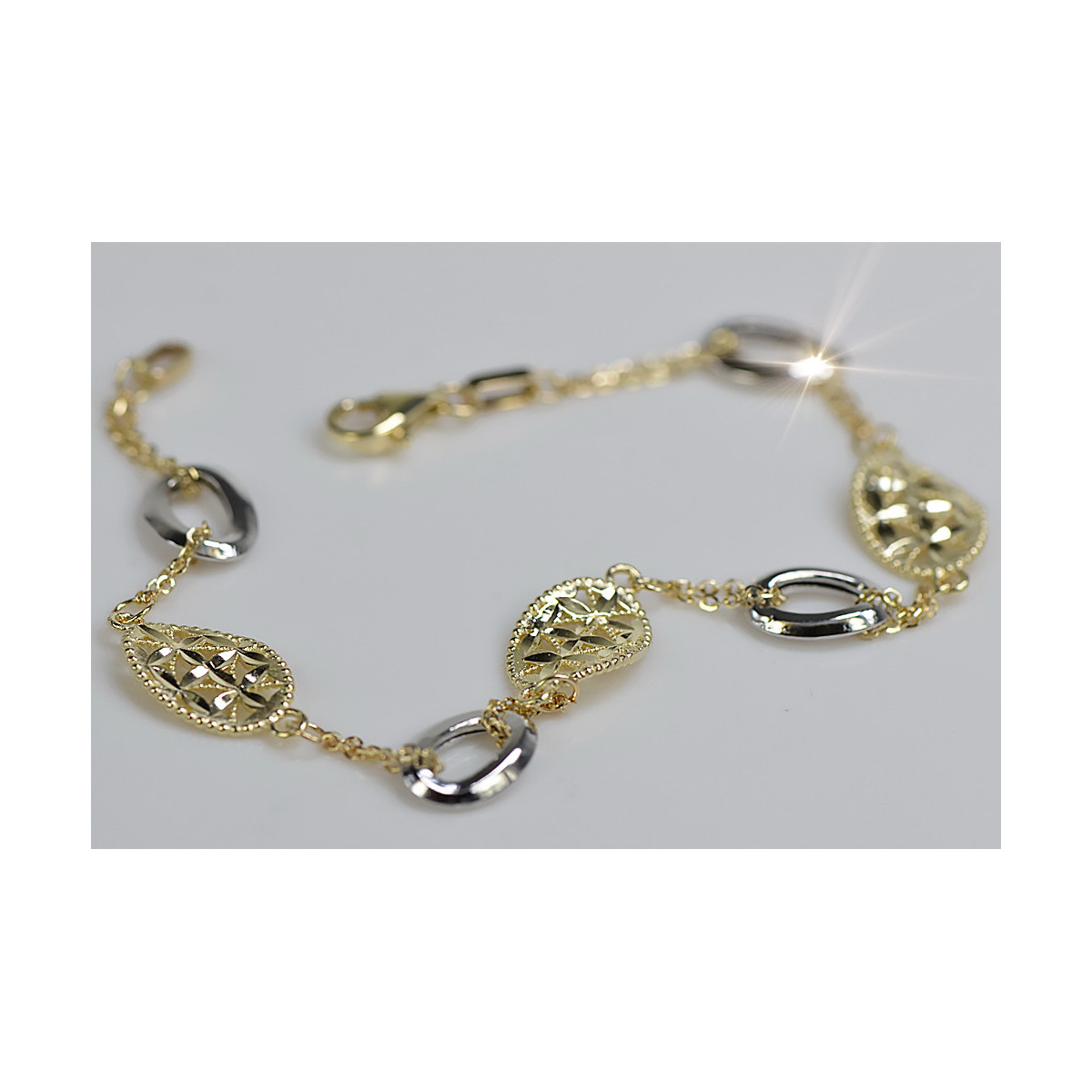 Pulsera de oro blanco y amarillo italiano de 14k con piedras preciosas. cb146yw