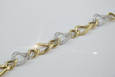 Pulsera de oro blanco y amarillo italiano con detalles elegantes cb141