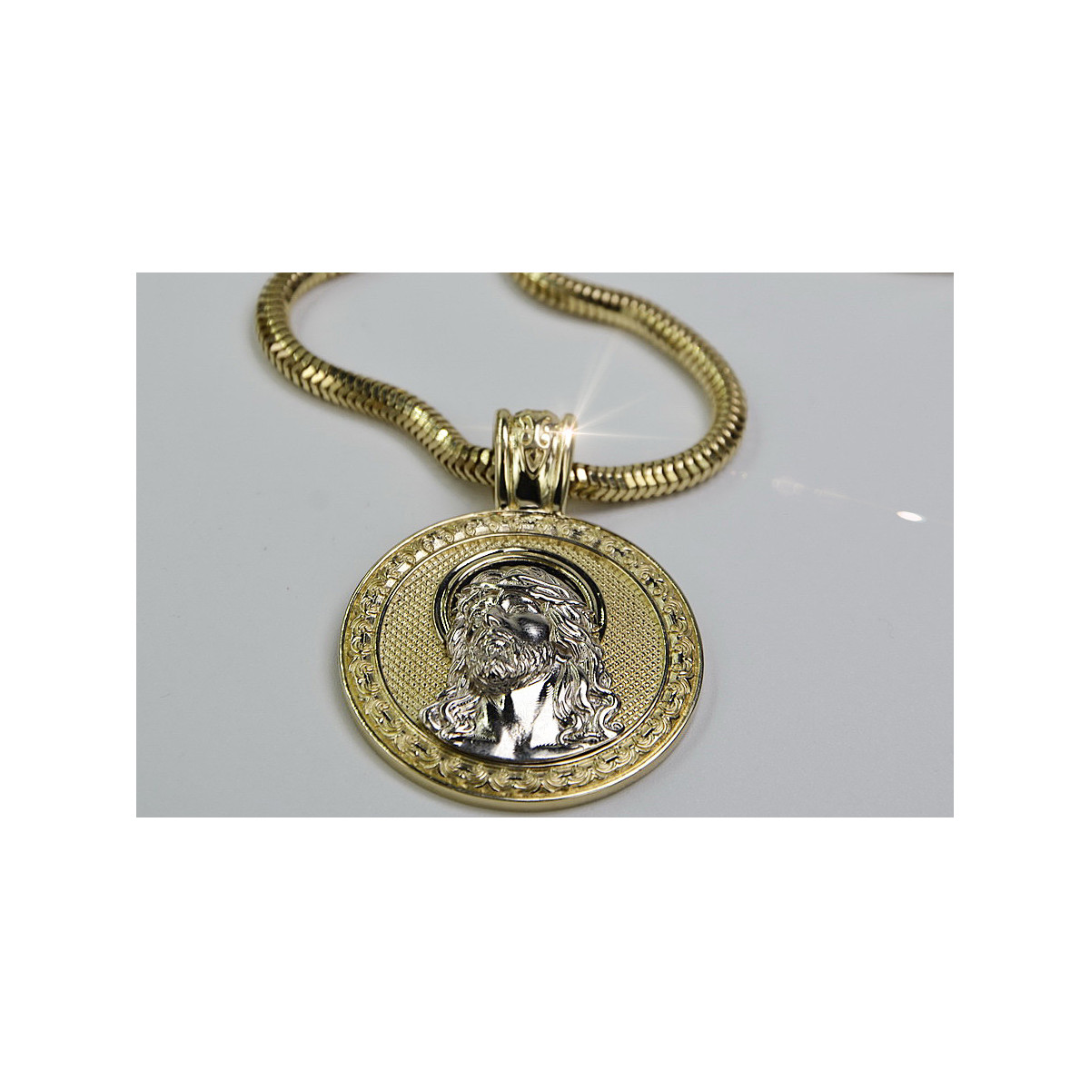 "Faithful Elegance: Gold Jesus Pendant on Luxe Rope Chain" 