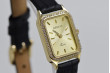 Montre femme en or jaune 14 carats, O. lw055y