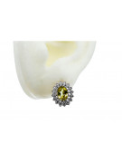 Aretes de Oro Blanco con Peridoto Amarillo de 14 Quilates vec125w